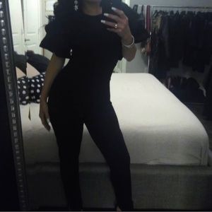 Black frills sleeve jumpsuit.